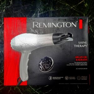 REMINGTON SHINE THERAPY BLOW DRYER.